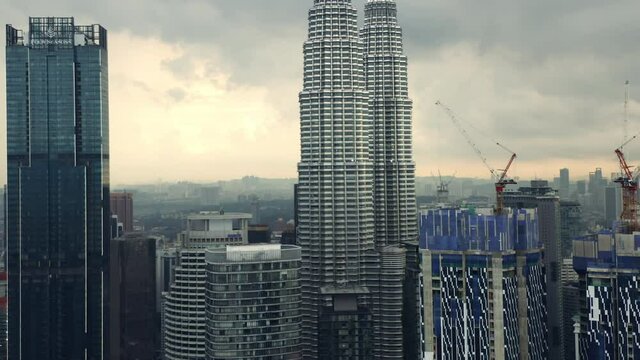 Star Residences buildings under construction beside Petronas Twin Towers, Kuala Lumpur