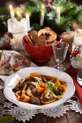 Obraz na płótnie Canvas traditional mushroom soup with noodles for Christmas Eve supper