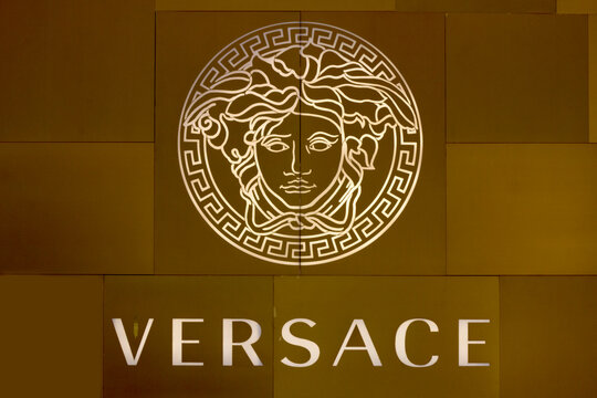 HO CHI MINH CITY, VIETNAM-OCTOBER 31ST 2013: Versace logo on store in Ho Chi Minh City. The logo is based on Medusa who was reputed to be so hideous that men turned to stone when looking at her.