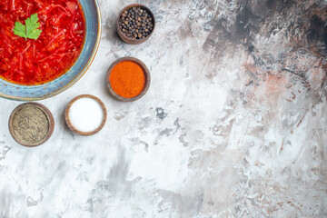 top view tasty borsch ukrainian beet soup with seasonings on white background cuisine dish color meal free space