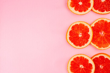 top view tasty grapefruits sliced juicy fruits on light pink background healthy life juice fresh color diet fre eplace
