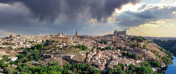 Toledo city in Spain whole cityscape from the hill with blue sky - 399681521