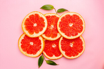 top view tasty grapefruits juicy fruit slices on pink background mellow color diet citrus juice fruits fresh