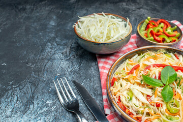 front view tasty vegetable salad with sliced cabbage and bell-peppers on grey background health...