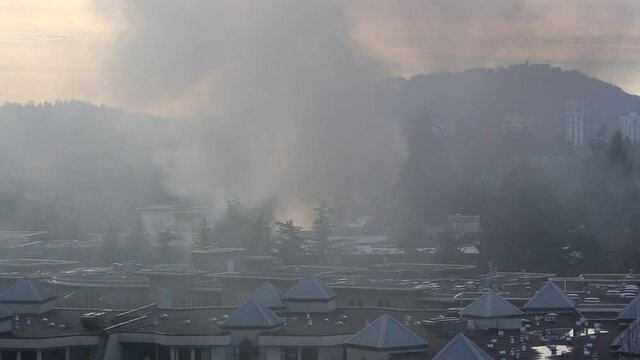 Heavy smoke coming from apartment complex fire on Glen drive in Coquitlam.