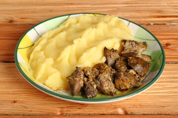 Fried chicken livers and mashed potatoes