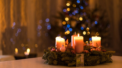 Christmas candles with a beautiful bokeh in background