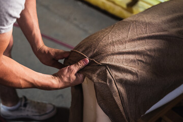 a man making a armchair