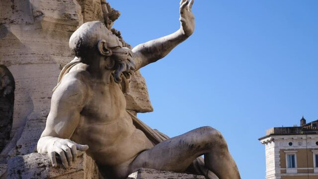Scuplture detail of fountain of the Four Rivers in Piazza Navona. Rome Italy.
