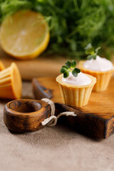 Canapes with light cream filling. Still life with microgreens. The concept of an appetizing snack.