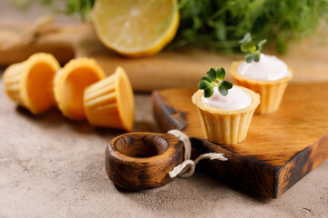 Canapes with light cream filling. Still life with microgreens. The concept of an appetizing snack.