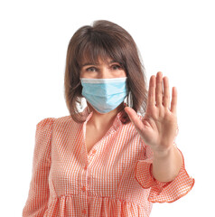 Beautiful mature woman wearing medical mask on white background. Concept of coronavirus epidemic