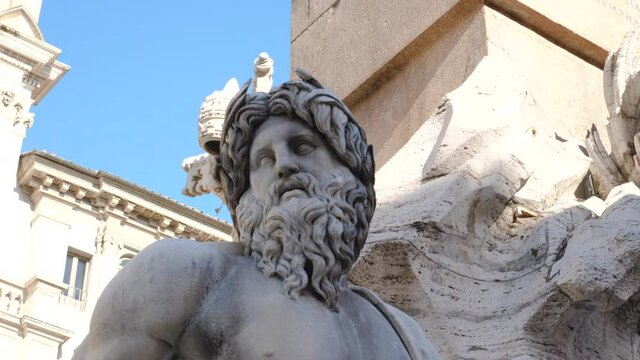 Scuplture detail of fountain of the Four Rivers in Piazza Navona. Rome Italy.