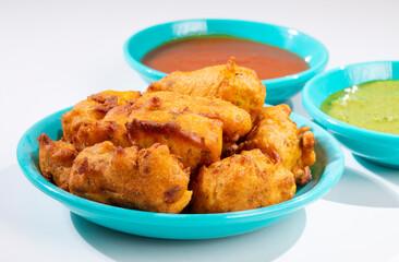 Indian Traditional Paneer Pakora or Pakoda Snacks on White Background
