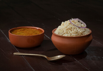 Indian Cuisine Jeera Rice With Dal Tadka Also Know As Cumin Rice on Vintage Wooden Background