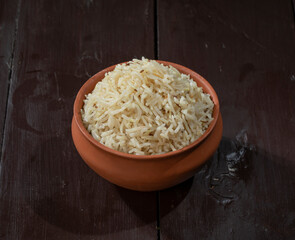 Indian Cumin Rice or Jeera Rice on Wooden Background