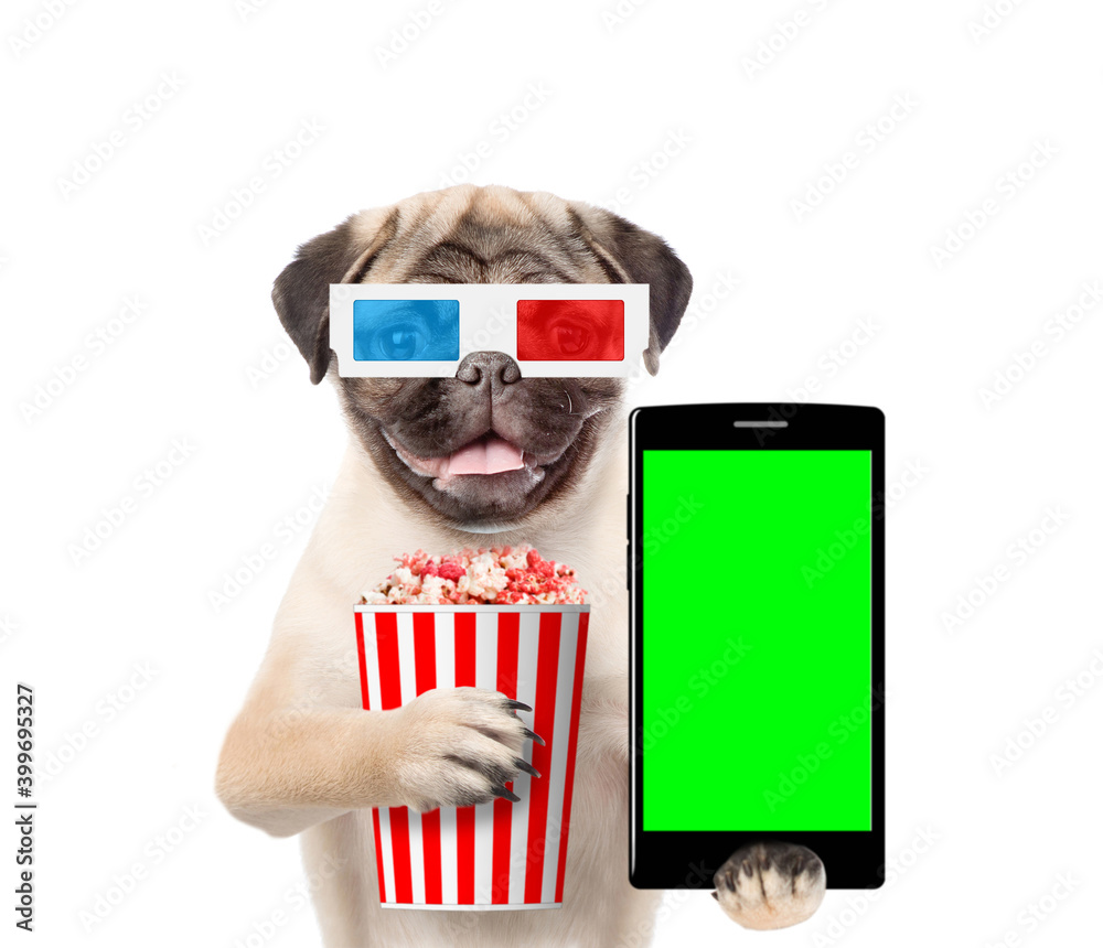 Poster Smiling puppy wearing 3d glasses holds basket of a popcorn and smartphone with empty screen. isolated on white background