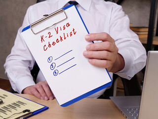  Financial concept meaning K-2 Visa Checklist with phrase on the piece of paper.