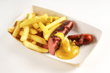 sausage with french fries in the box