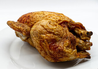 Whole roasted chicken isolated on white background
