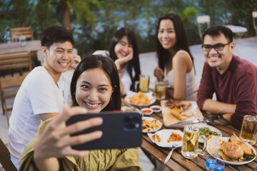 Asian people party and take a selfie