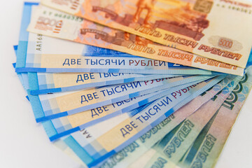 Fototapeta na wymiar Currency russians rubles including new 5000 and 2000 rub in set. Isolated on white background