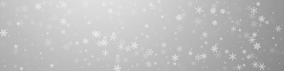 Sparse snowfall Christmas background. Subtle flyin