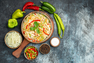 top view tasty salad with fresh vegetables on grey background food meal health color free space