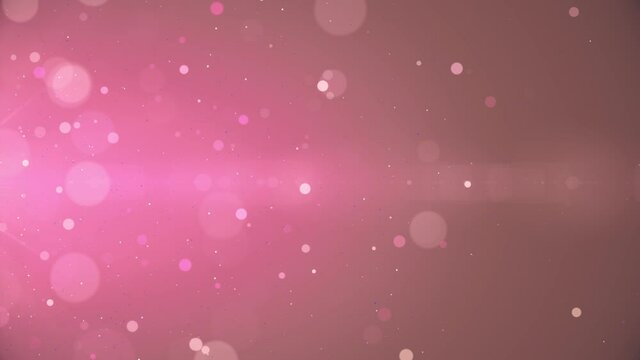 Pink blurry bokeh background with lights particles on rose background. Defocused photo effect. Slow motion animation