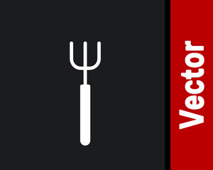 White Garden pitchfork icon isolated on black background. Garden fork sign. Tool for horticulture, agriculture, farming. Vector.