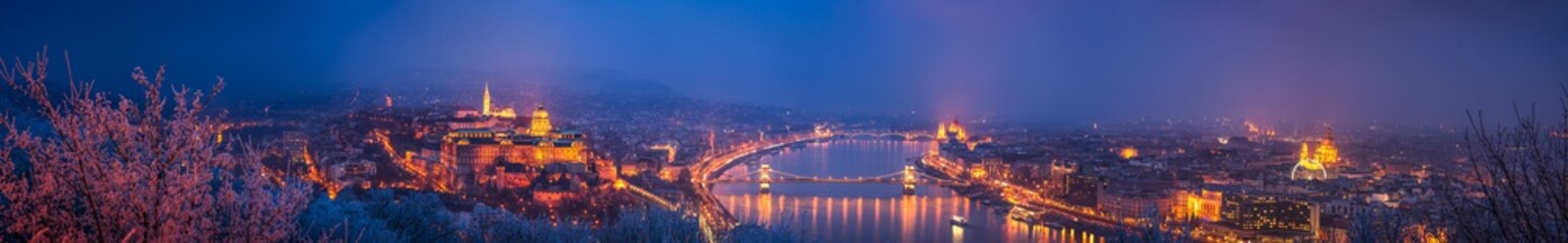 Panorama of Budapest at dusk overlooking Chain bridge and Parliament. Hungary