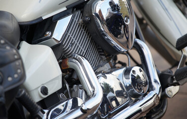 Motorcycle shiny metal pipes and engines