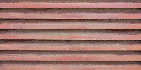 Old dirty used red colored grunge wooden panels background