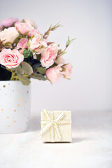 Rose flowers bouquet and gift box. Valentine's day, birthday, Mother's Day concept. Romantic Holiday season.