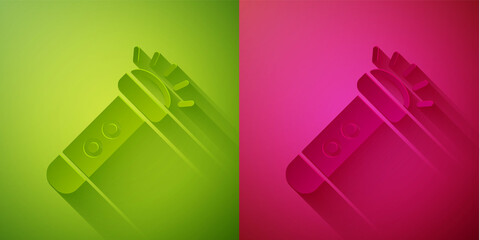 Paper cut Flashlight icon isolated on green and pink background. Paper art style. Vector.