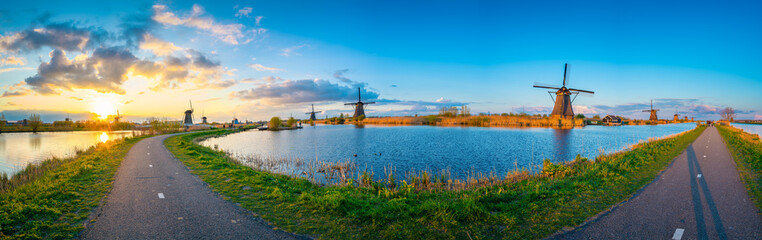 Fototapeta na wymiar Panorama of traditional Dutch windmills Kinderdijk in Netherlands