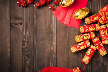 Chinese new year 2021 festival, Top view flat lay lunar new year or Happy Chinese new year decorations celebration with copy space on the wood background (Chinese character "fu" meaning fortune)