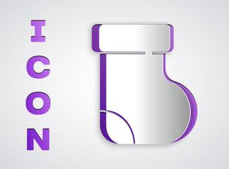 Paper cut Baby socks clothes icon isolated on grey background. Paper art style. Vector.