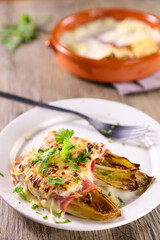 baked chicory with ham and cheese