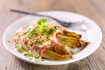 baked chicory with ham and cheese