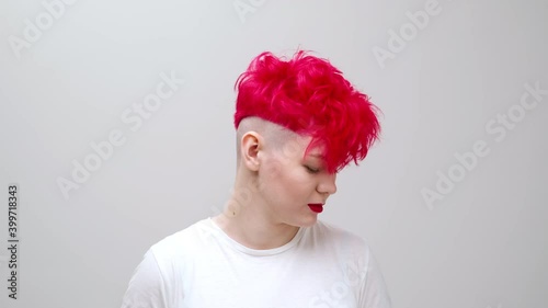 Young Beautiful Girl With A Short Bob Haircut Red Colored Dyed Hair And Sunglasses The Model Poses In The Studio On A White Background 1 Wall Mural Spaskov Young Beautiful Girl With A Short Bob Haircut Red Colored Dyed Hair And Sunglasses The Model Poses In The Studio On A White Background 1 Wall Mural Spaskov