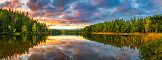 Beautiful sunset at the lake in autumn