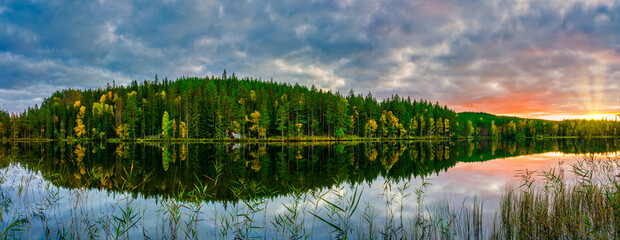 Sunset at the lake in autumn season