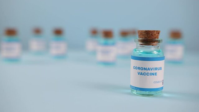 New vaccine pfizer and biontech isolated on blue background. Covid-19, 2019-ncov pandemic. Coronavirus inoculation concept. Sars-cov-2. Ready-made preparations with doses