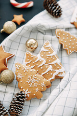 christmas flatley layout with cookies and a christmas tree. composition with ginger cookies and cones on a light background.