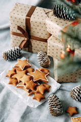 christmas flatley layout with cookies and a christmas tree. composition with ginger cookies and cones on a light background.