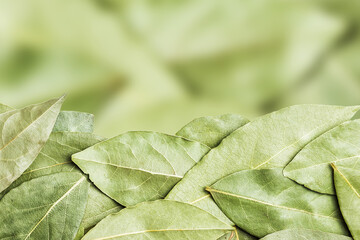 Bay leaf background. Kitchen seasoing texture. Cooking ingredient background. Soup preparation top view. Empty copy space bay leaf isolated. Food herb texture.