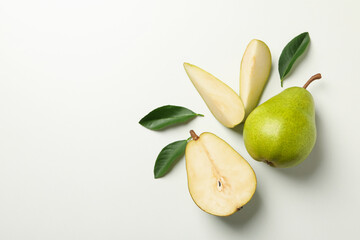 Fresh green pears on white background, top view