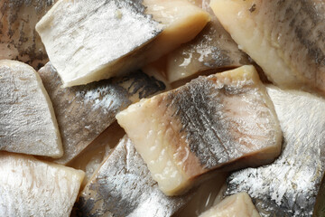 Fresh herring fish slices background, close up