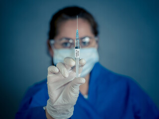 Scientist working on the development of the COVID-19 Vaccine. Coronavirus immunization treatment.